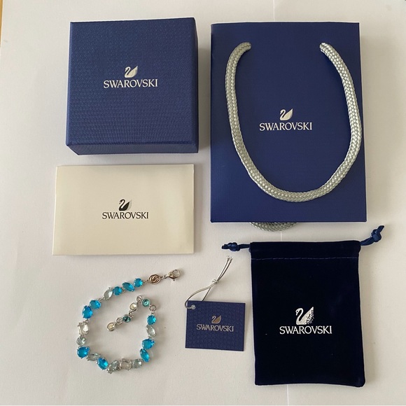New in Box $249 Swarovski Gema Blue Clear Color Crystals Silver Tone Bracelet